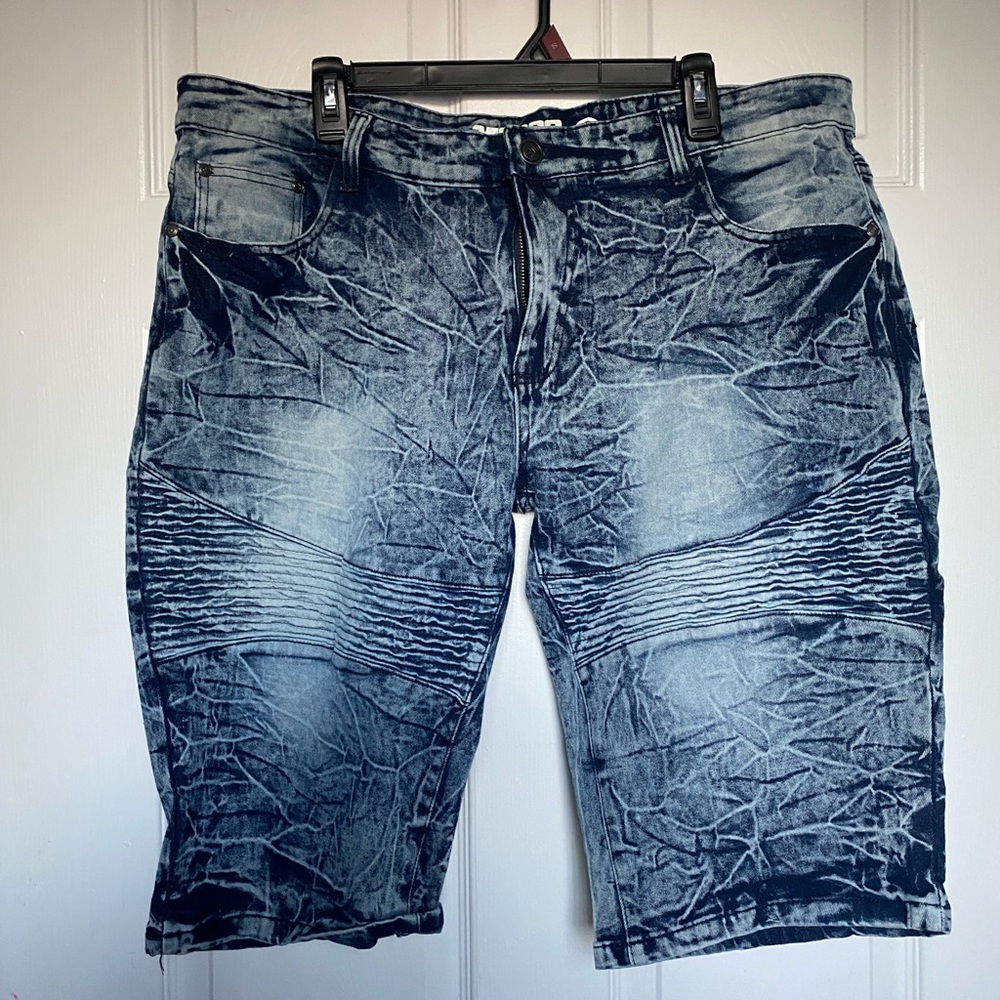 Mecca Blue Jean Shorts with Distressed Design and Knee-Length Fit